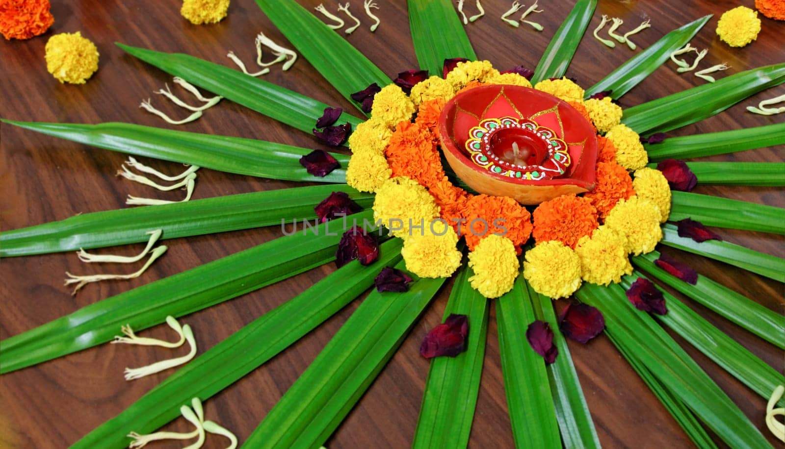 Rangoli, floral design display Hindu Festival by womenfolk a custom done outdoors or indoors during celebrations like Diwali and Holi, landscape, horizontal with crop margin