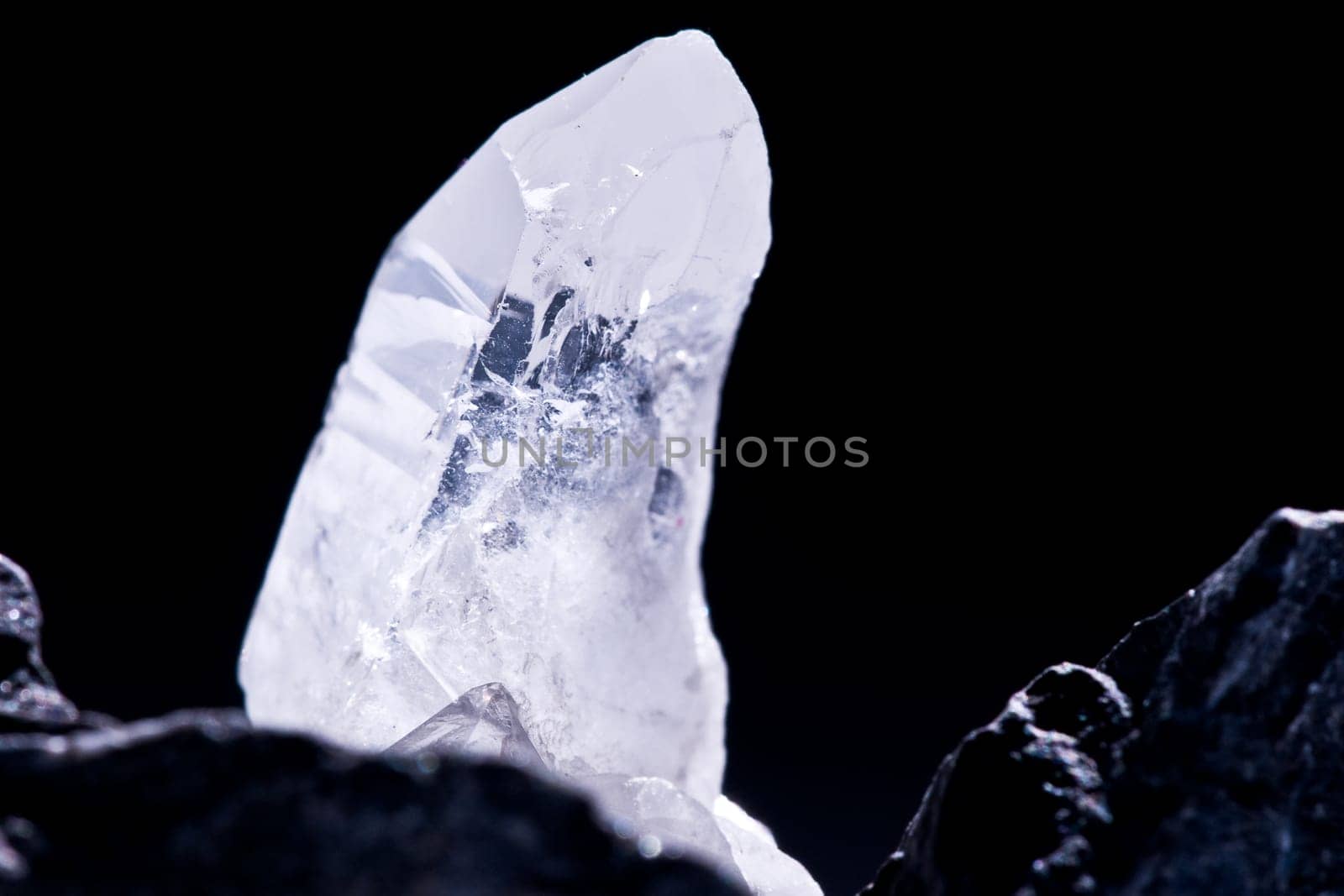 White Glowing Rock Crystal Quartz with Black Background