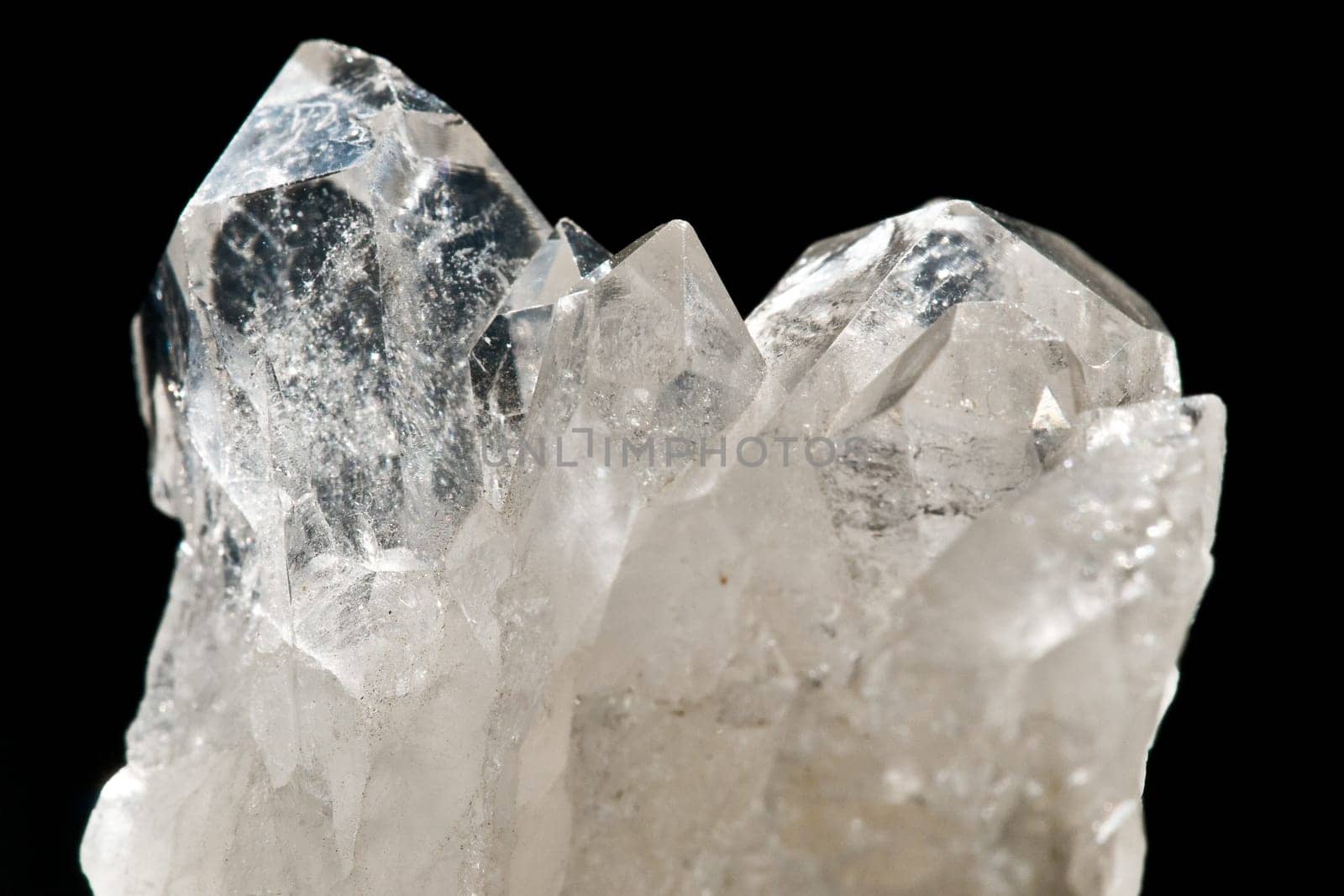 White Glowing Rock Crystal Quartz with Black Background