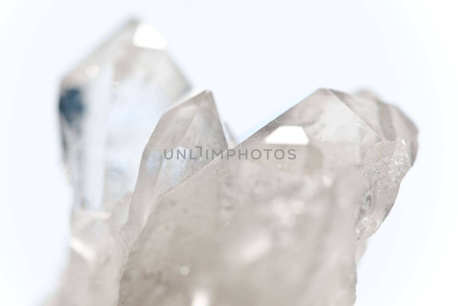 White Glowing Rock Crystal Quartz with White Background