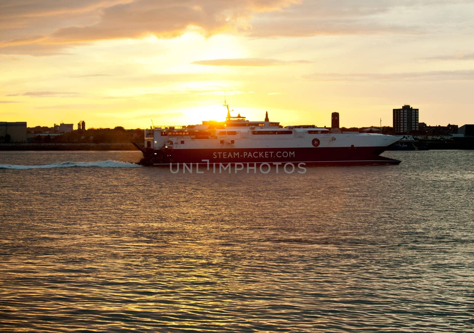 CROSBY BEACH, ENGLAND - SEPTEMBER 24: Steam Packet ferry sails from Liverpool on September 24, 2011. The 96-metre wave piercing catamaran is the largest vessel of its kind in the Irish Sea.
