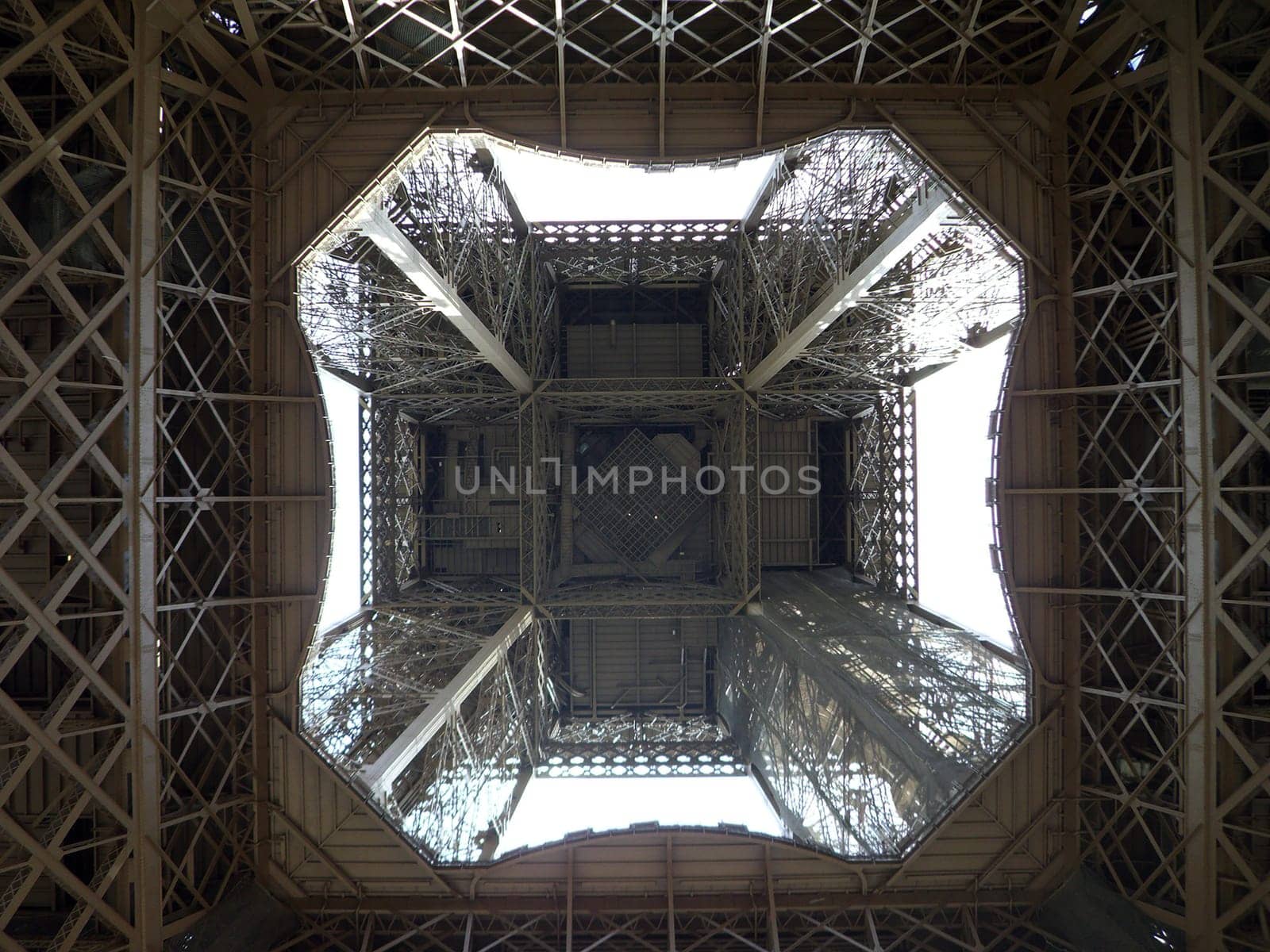 Unusual view inside the center of the Eiffel tower in Paris