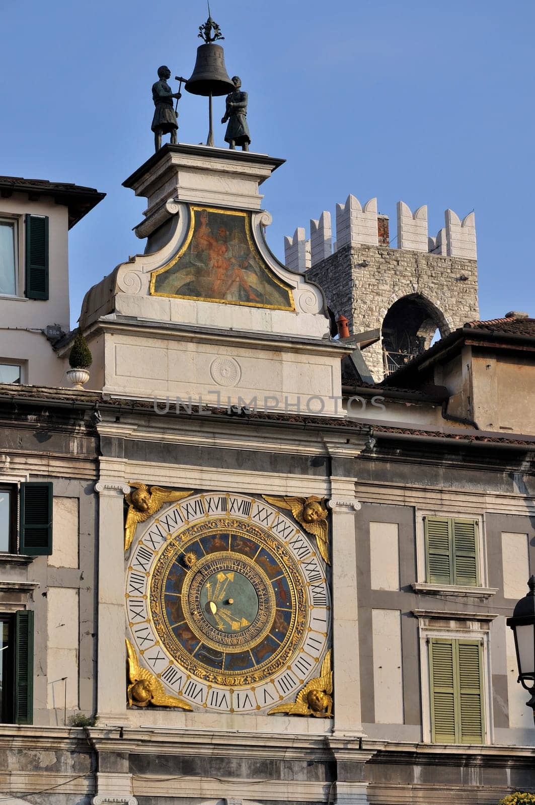 rinascimental wall clock in the central square, famous also for the terrorist attack