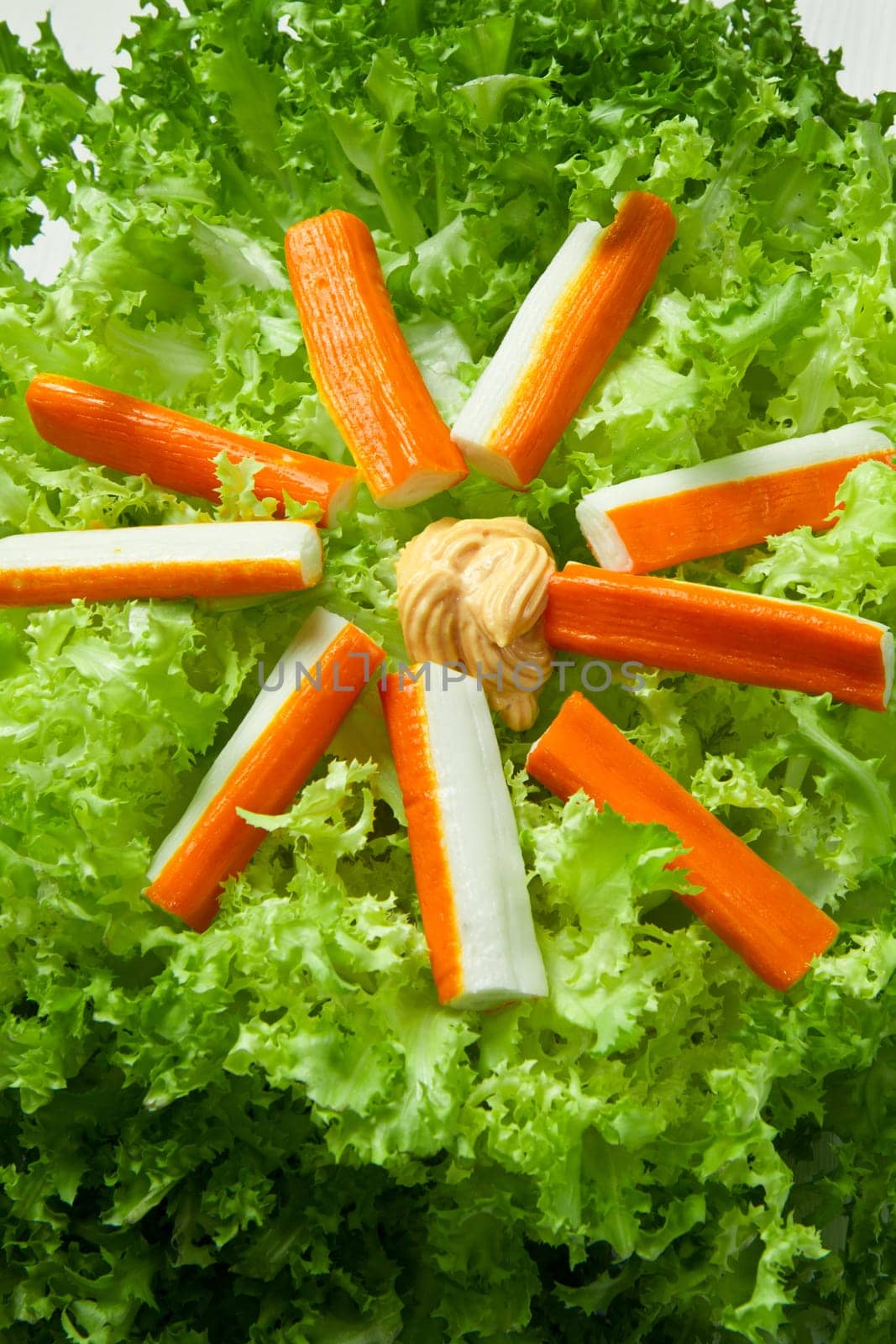 crab salad with fresh lettuce and cocktail sauce