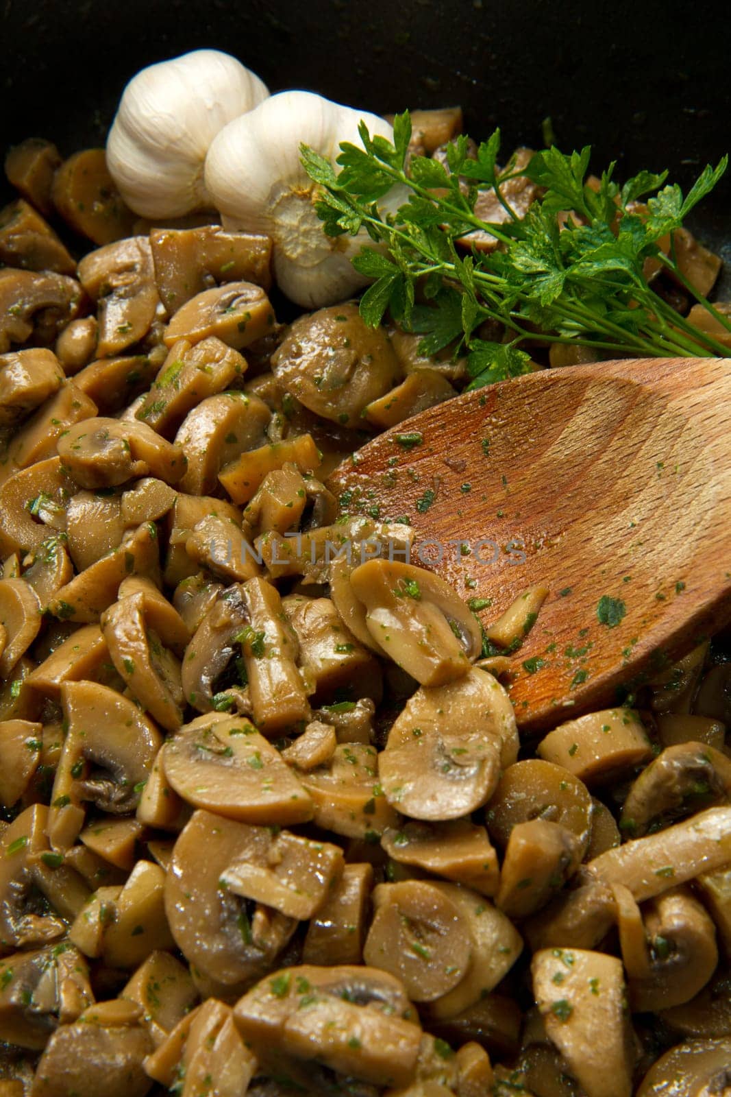 cooked mushroom with parsley and garlic