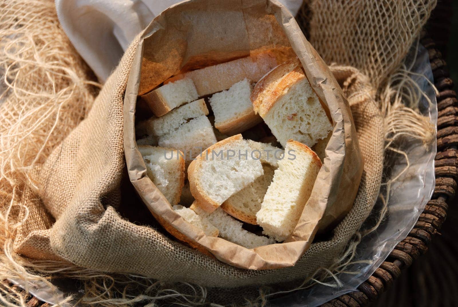 pieces of bread in a paper bag