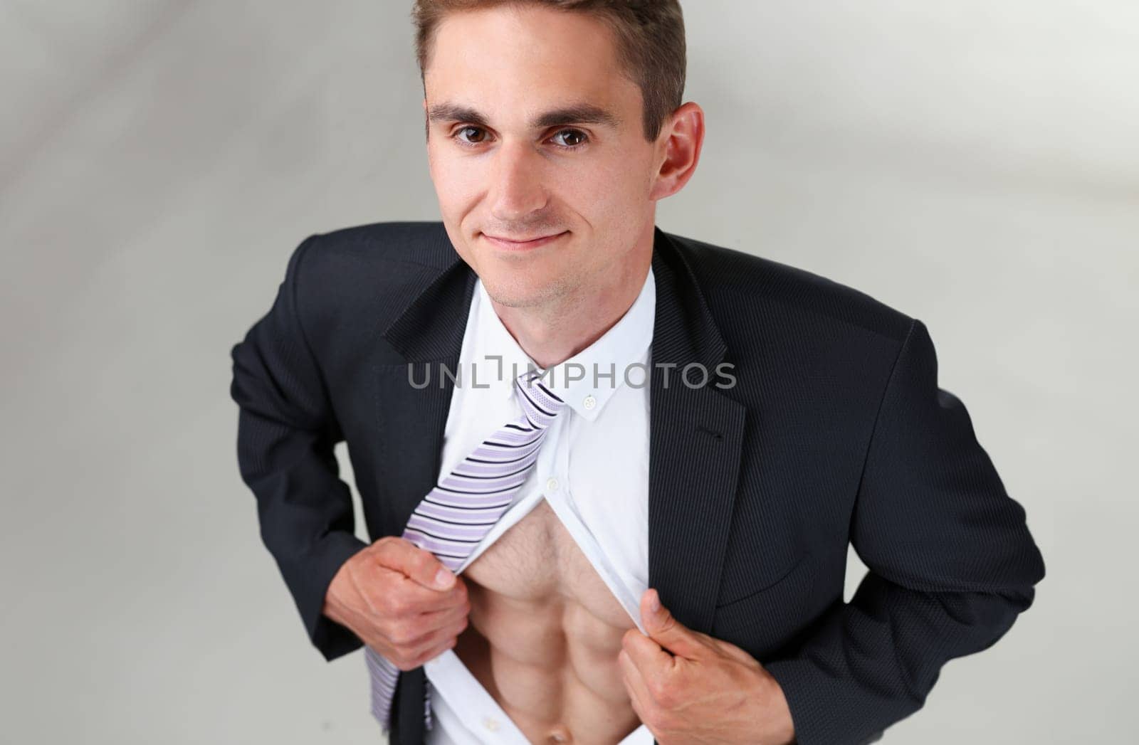 man in tie rip clothes off torso showing abs. Super human reveal, white collar healthy life style, perfect muscular train, weight loss, wellness nutrition, powerful job concept