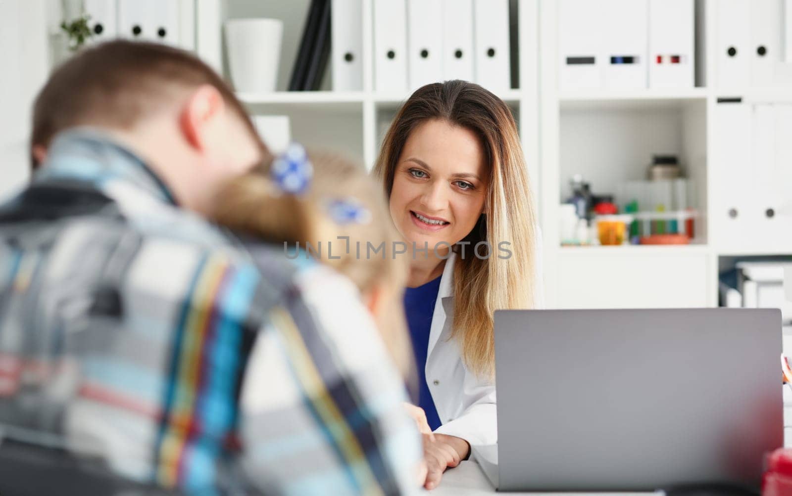 Little child with father at pediatrician reception. Physical exam cute infant portrait baby aid healthy lifestyle ward round child sickness clinic test high quality and trust concept