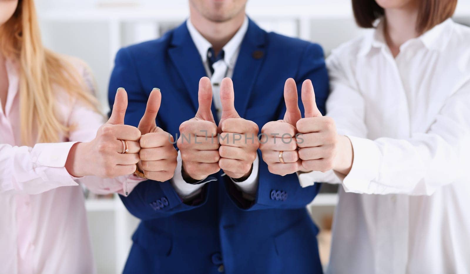 Group of people show OK or approval with thumb up during conference closeup. High level quality product serious offer excellent education mediation solution creative advisor participation concept