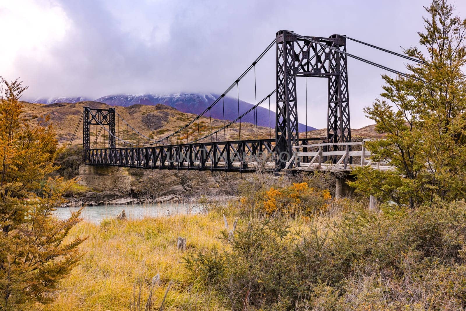 The old Puente Laguna Amarga over the Rio Paine in Torres del Paine National Park, Chile