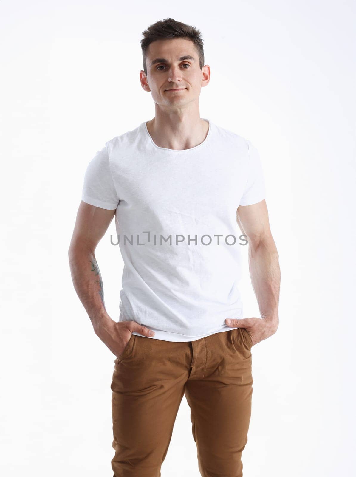 Young successful businessman on a white by kuprevich