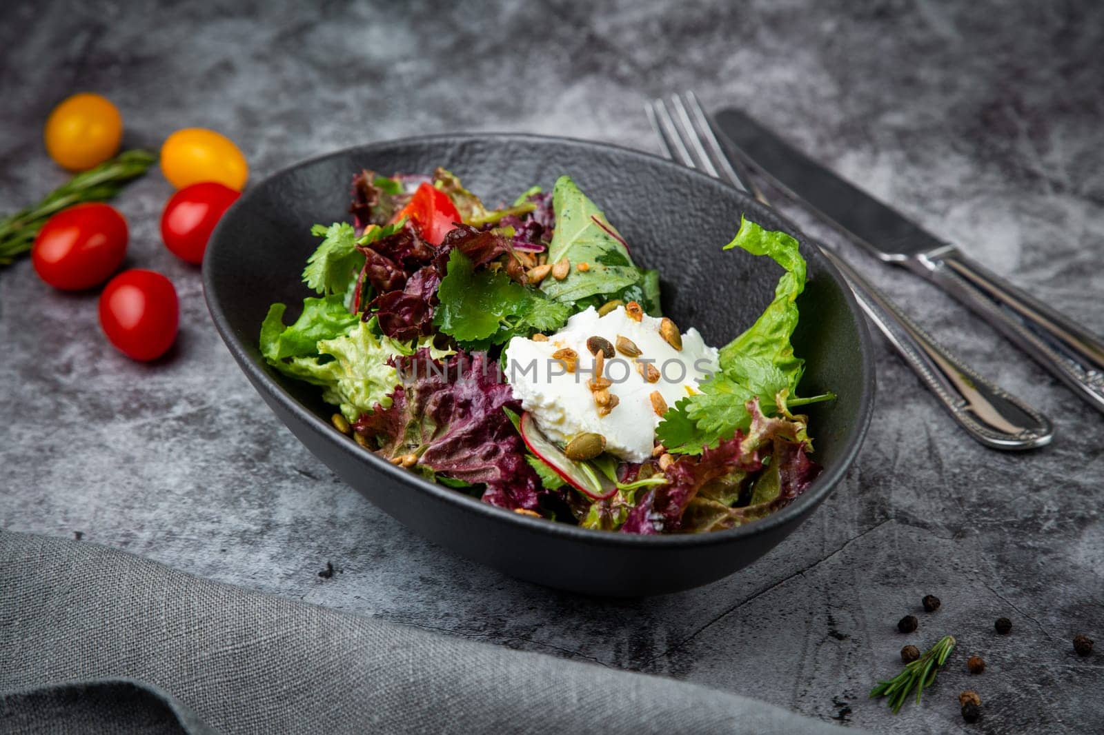 fresh salad with herbs and cherry tomatoes