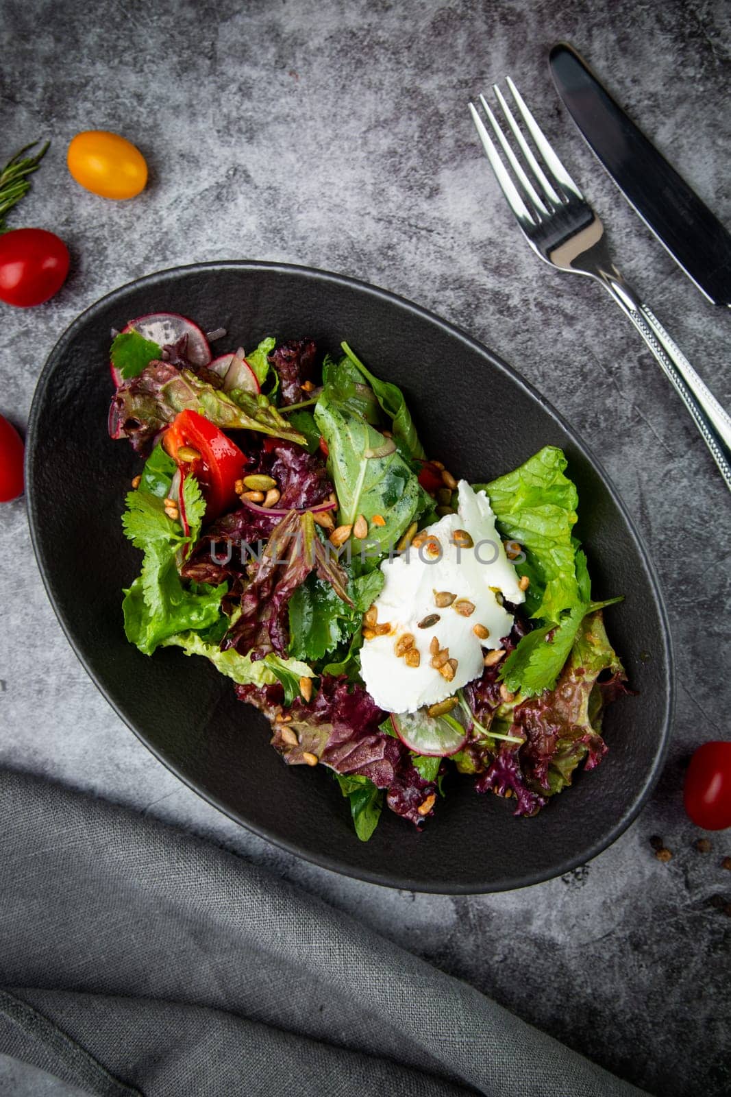 fresh salad with herbs and cherry tomatoes