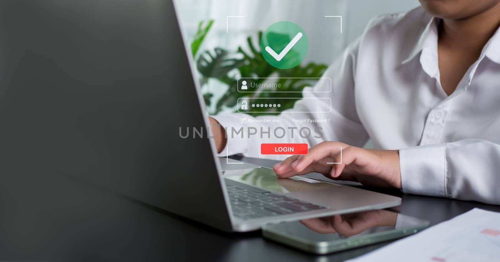 Businesswoman using computer to login represents protection concept of cyber security and data security including secure login.