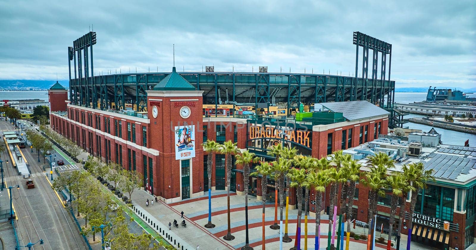 Image of Aerial Oracle Park sign with clock of ballpark with palm trees