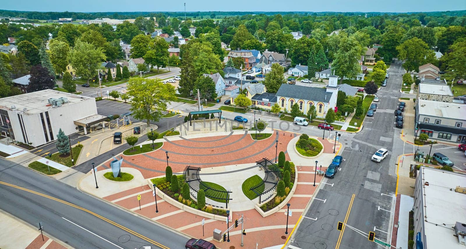 Image of James Cultural Plaza in Auburn with houses and church aerial