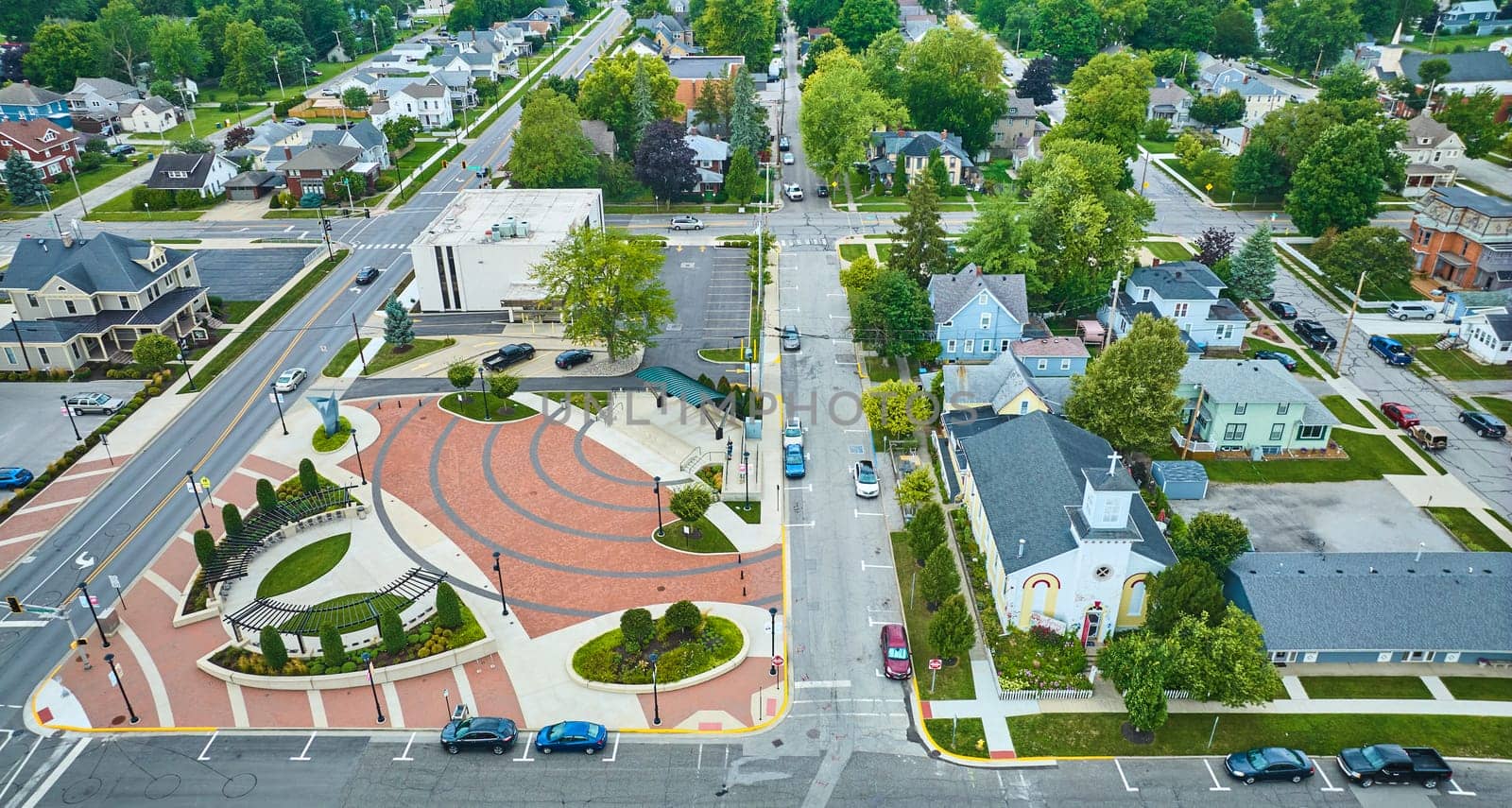 Image of Aerial James Cultural Plaza with church and Auburn houses