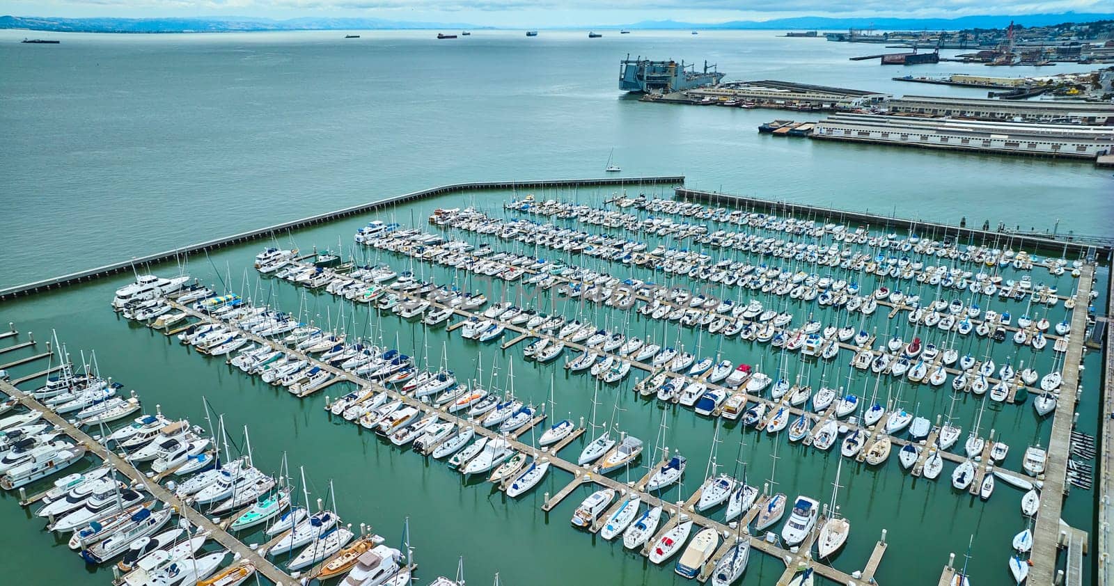 Image of Aerial South Beach Harbor with large tanker boats in San Francisco Bay