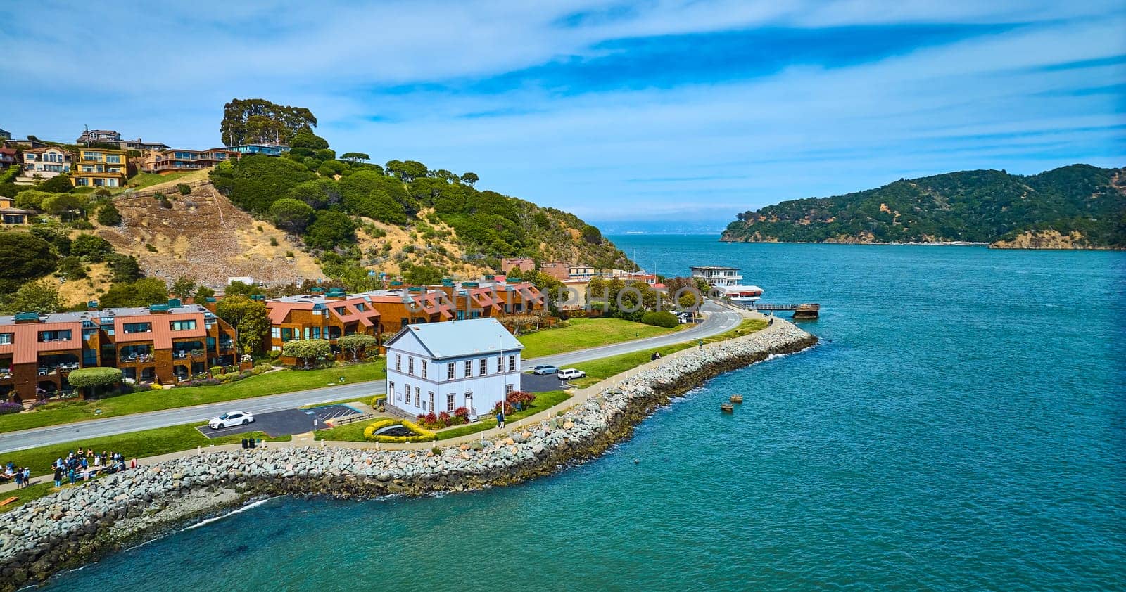 Image of Tiburon Railroad and Ferry Depot Museum aerial with hilly coastline