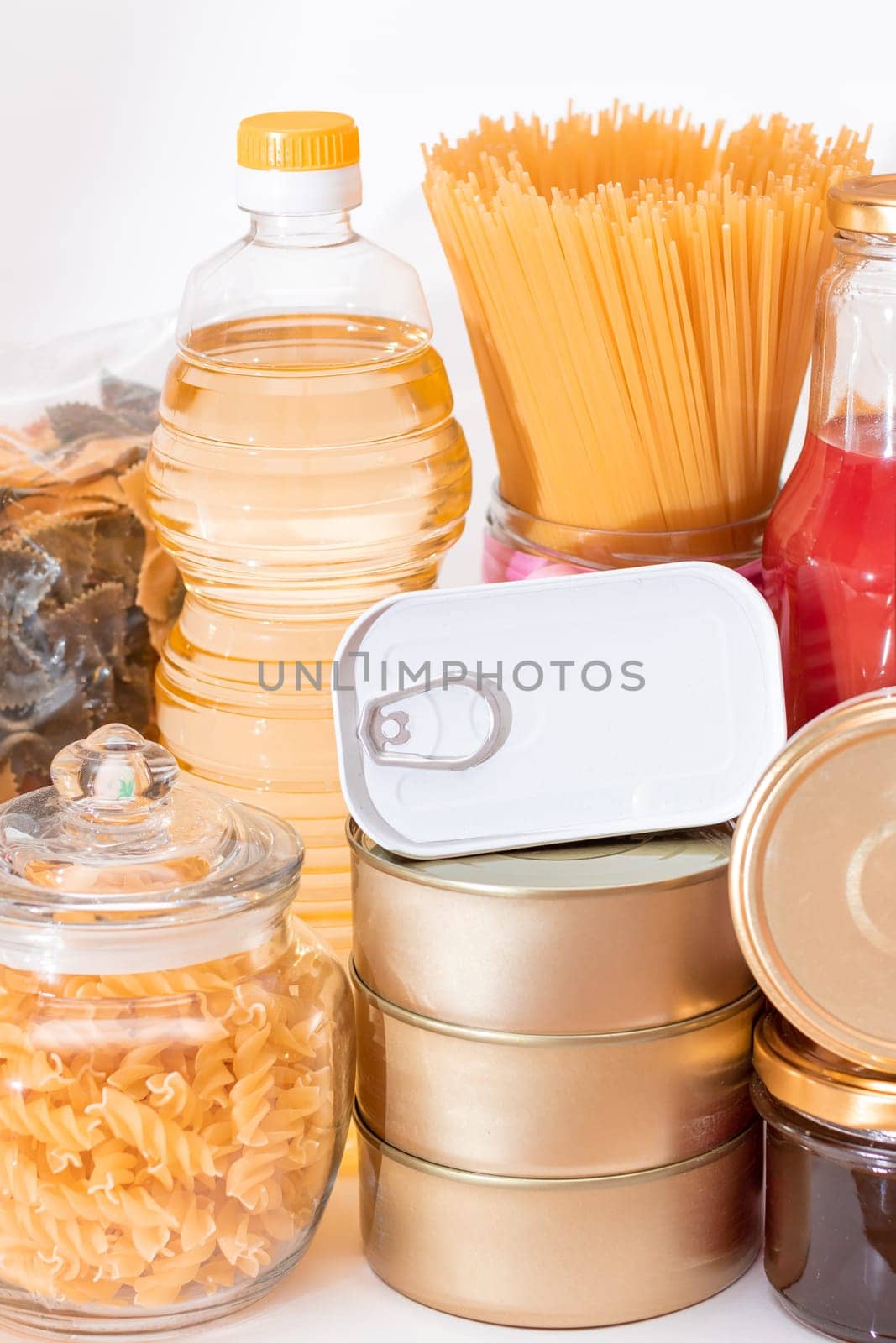 Food Reserves: Canned Food, Spaghetti, Tomato Juice, Pasta and Grocery. Emergency Food Storage in Case of Crisis. Strategic Food Supplies