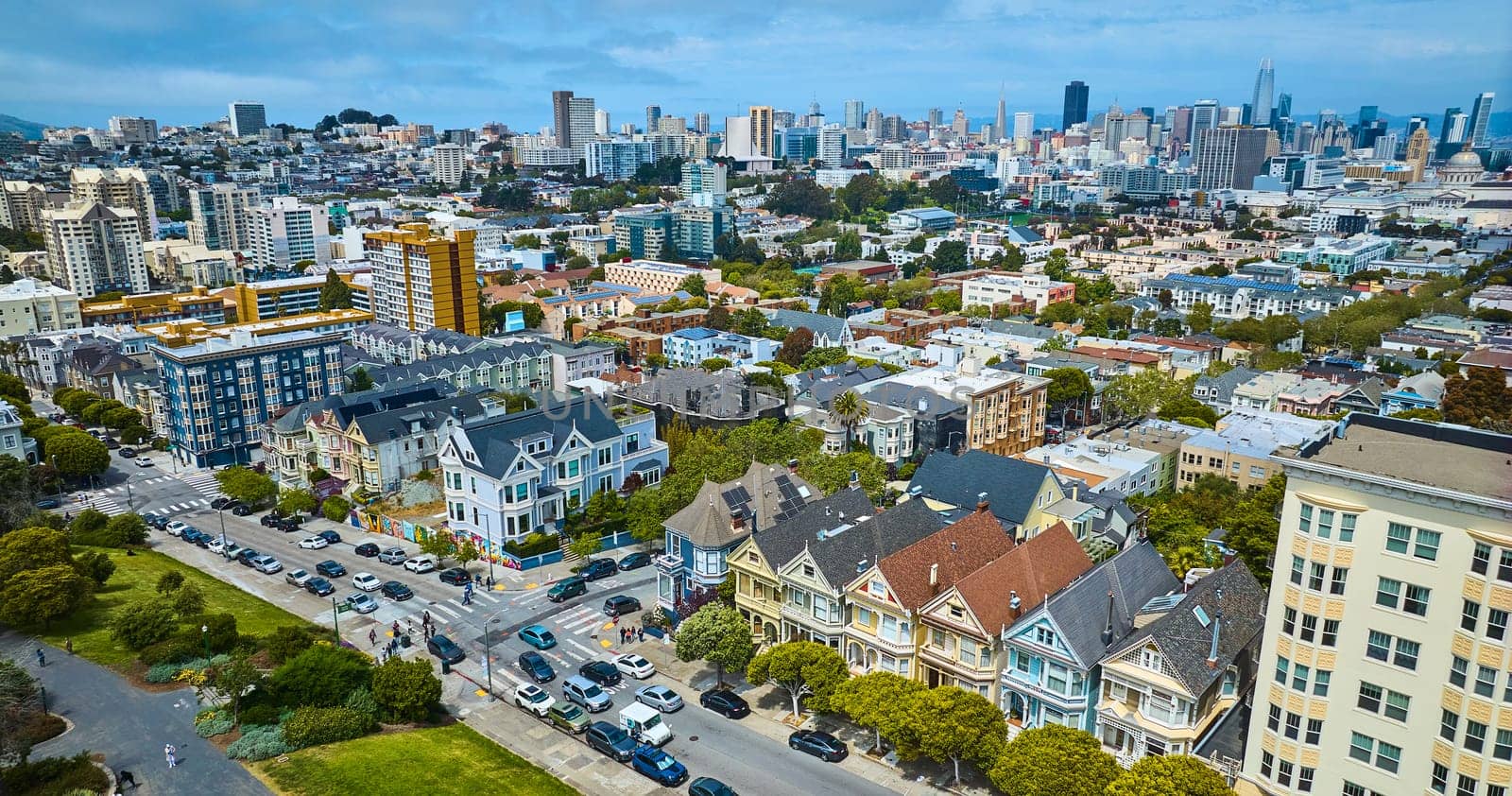 Image of Aerial The Painted Ladies houses with wide view of San Francisco