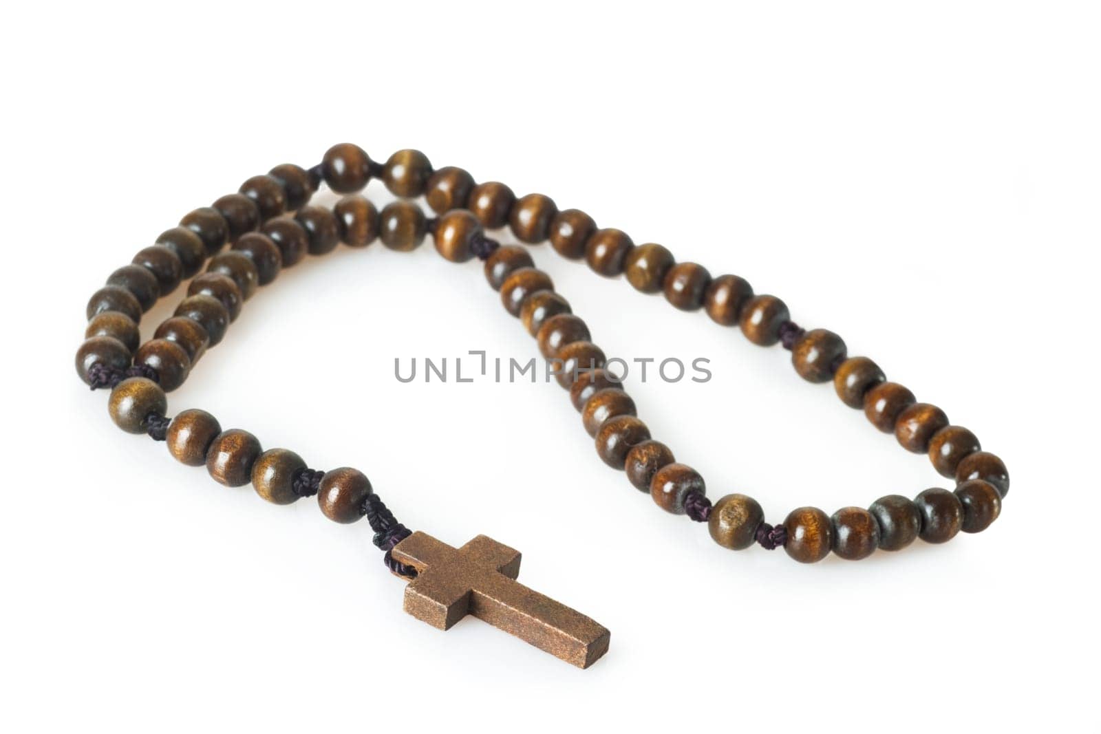 Rosary isolated on light background