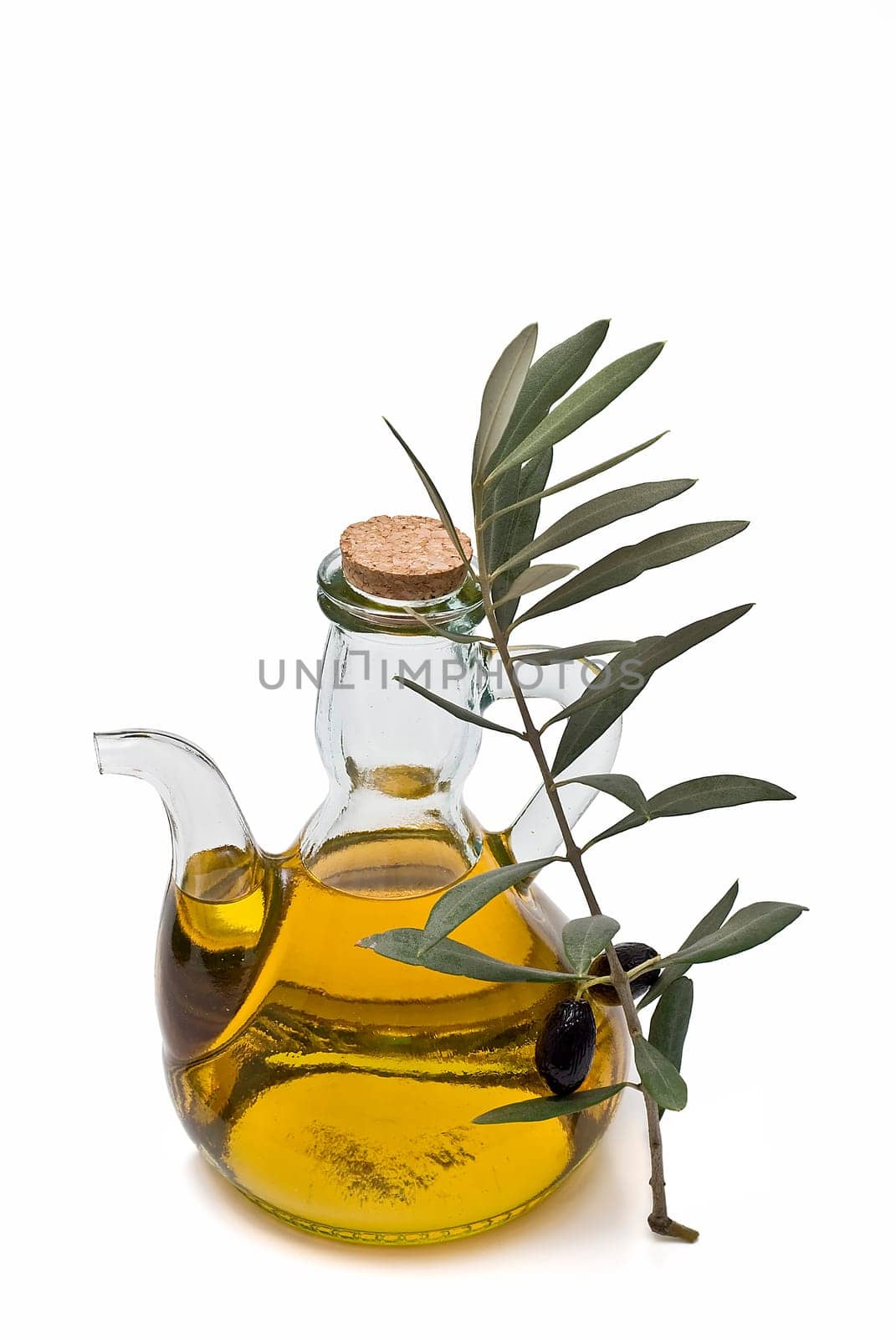 Virgin olive oil and olives isolated on a white background.
