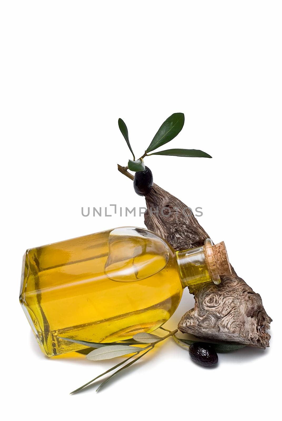 Virgin olive oil and olives isolated on a white background.