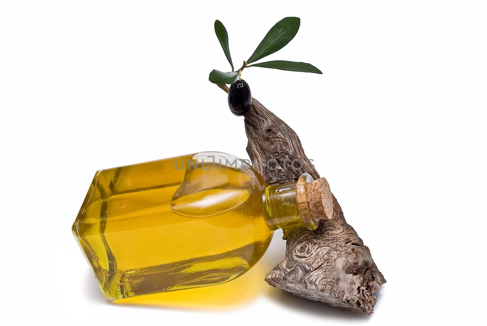 Virgin olive oil and olives isolated on a white background.