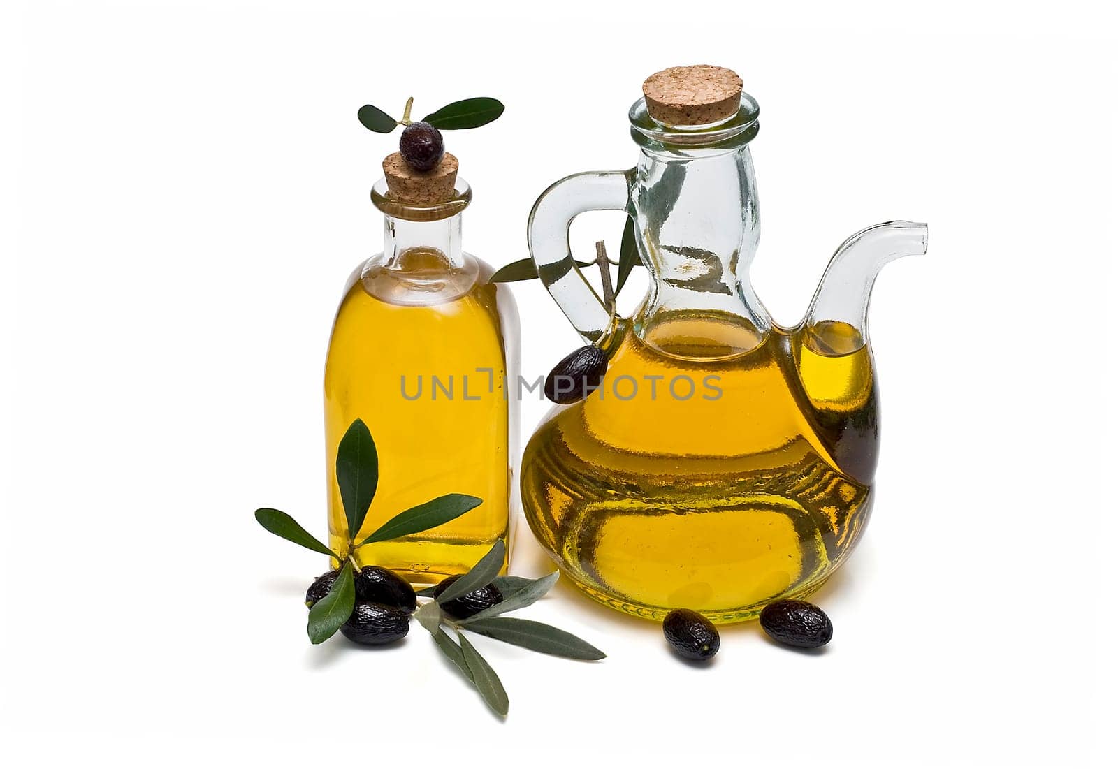 Virgin olive oil and olives isolated on a white background.