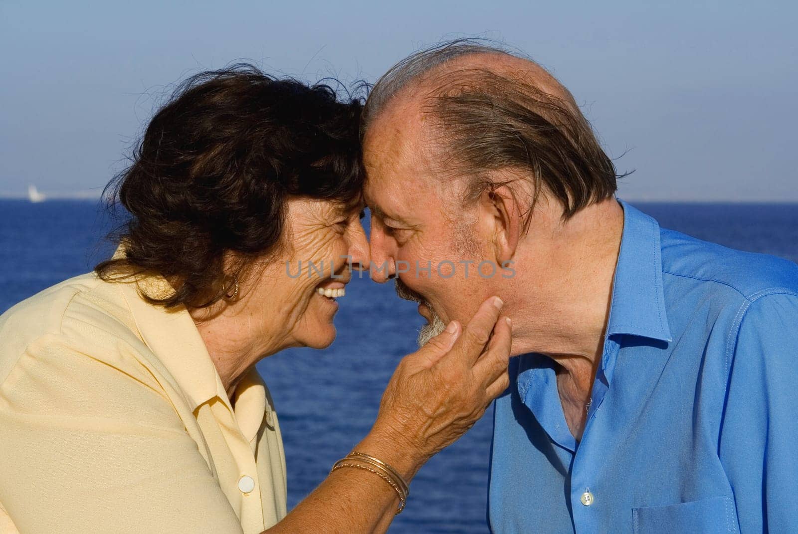 happy senior couple on summer holiday or vacation