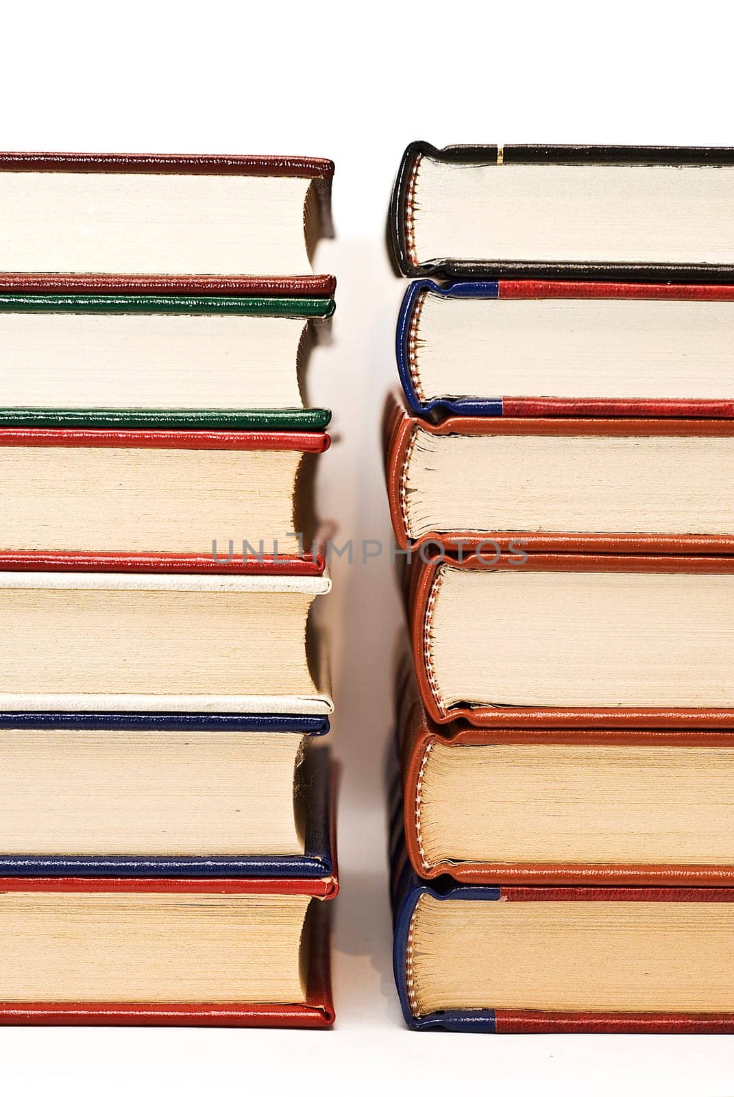 OLd books isolated over a white background.