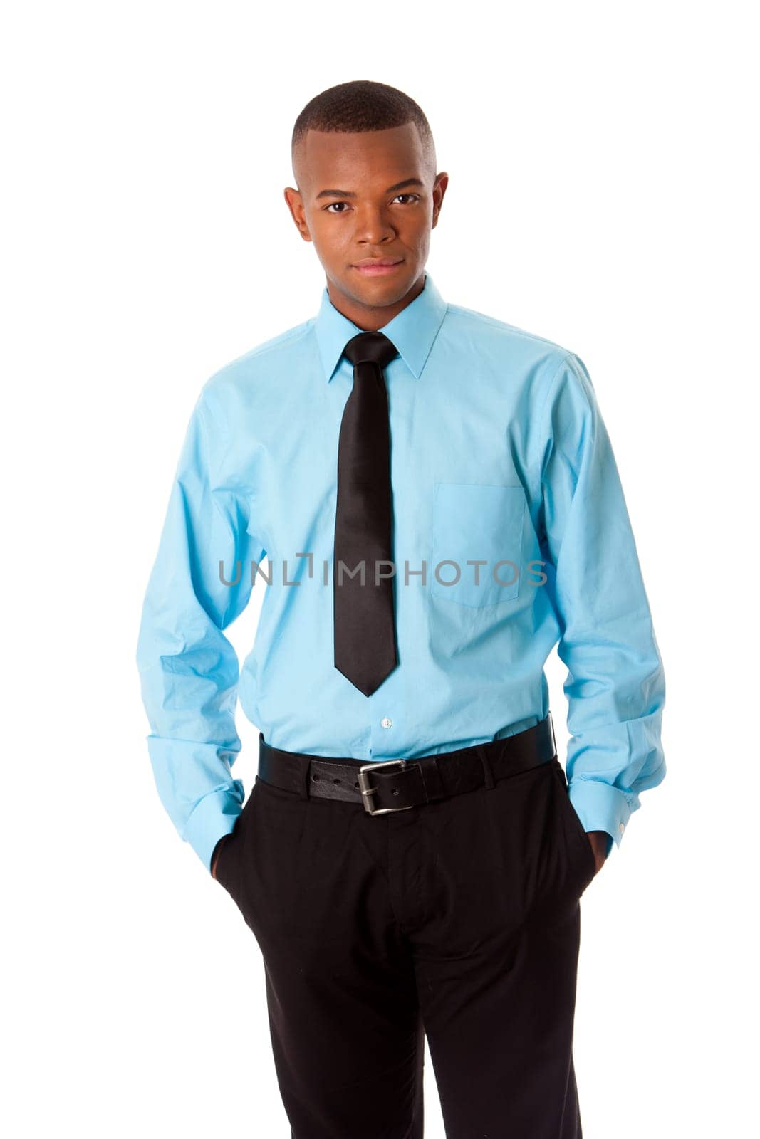 Handsome attractive successful corporate business executive standing with hands in pocket, isolated.