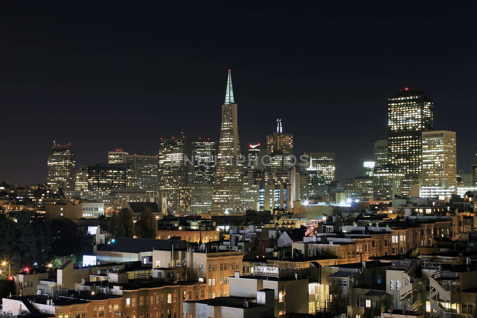 San Francisco skyline at night, dominated by the Transamerica building
