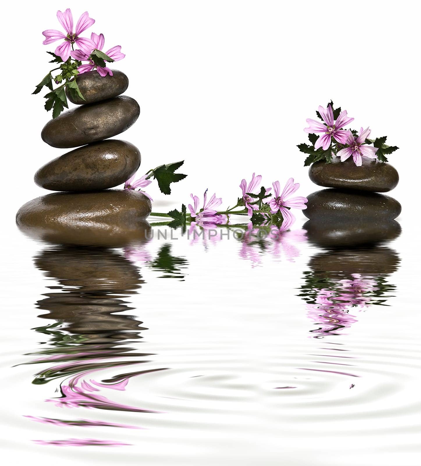 Boulders in zen balance over a white background.