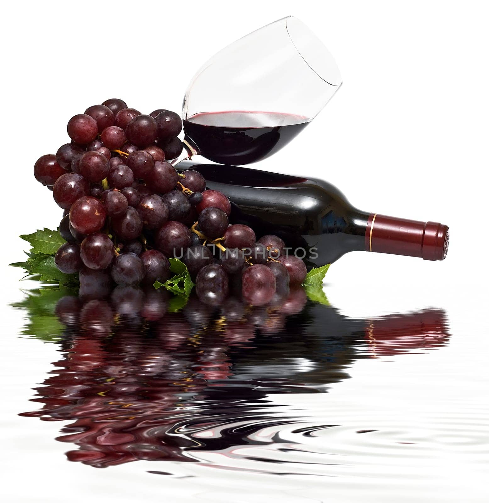 Still life abour red wine with a white background.