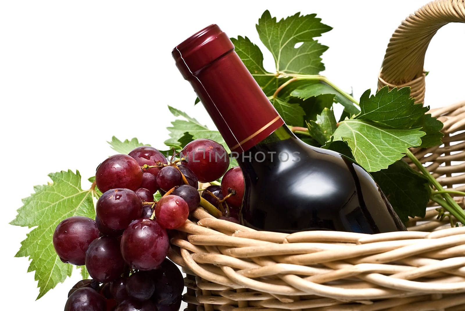 Still life abour red wine with a white background.
