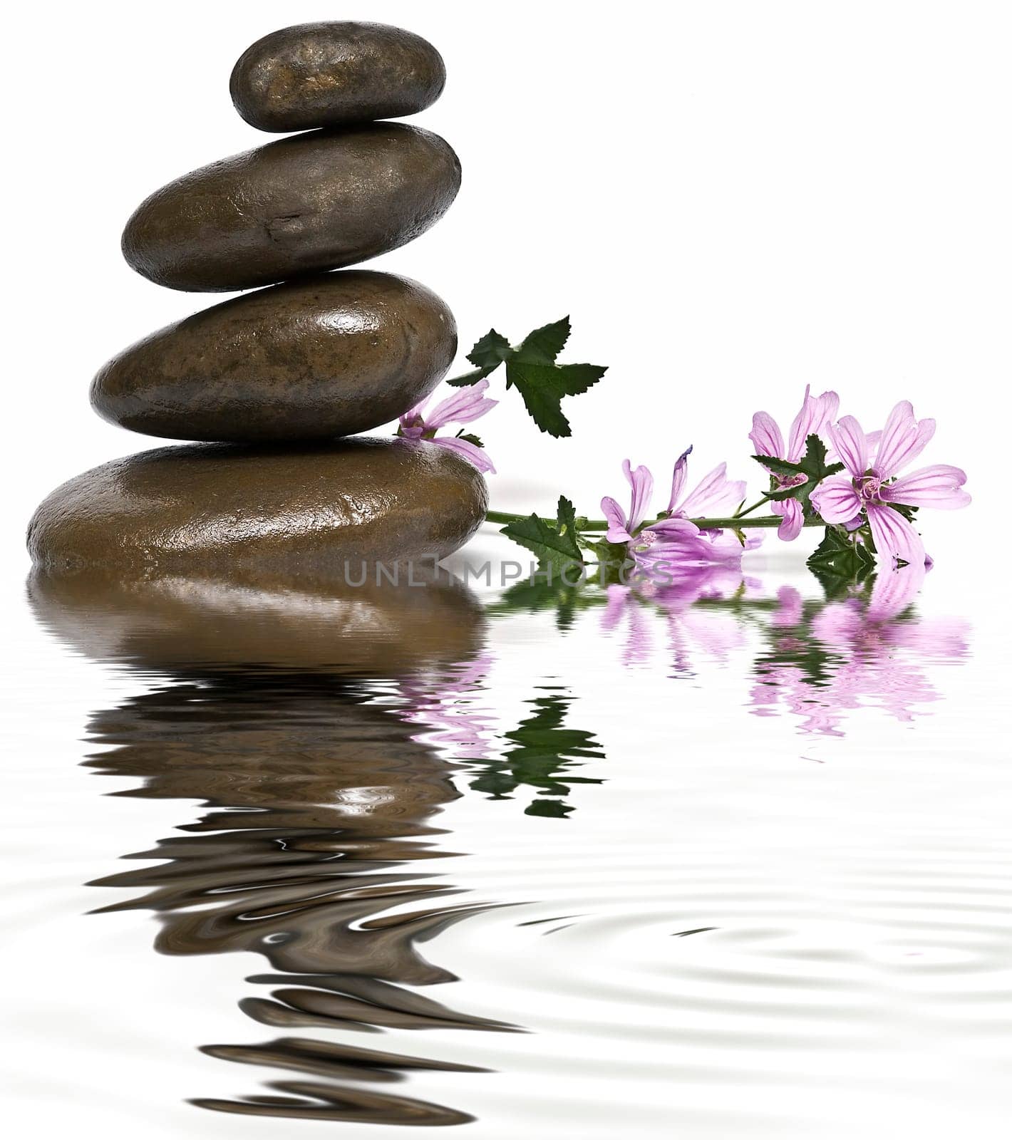 Boulders in zen balance over a white background.