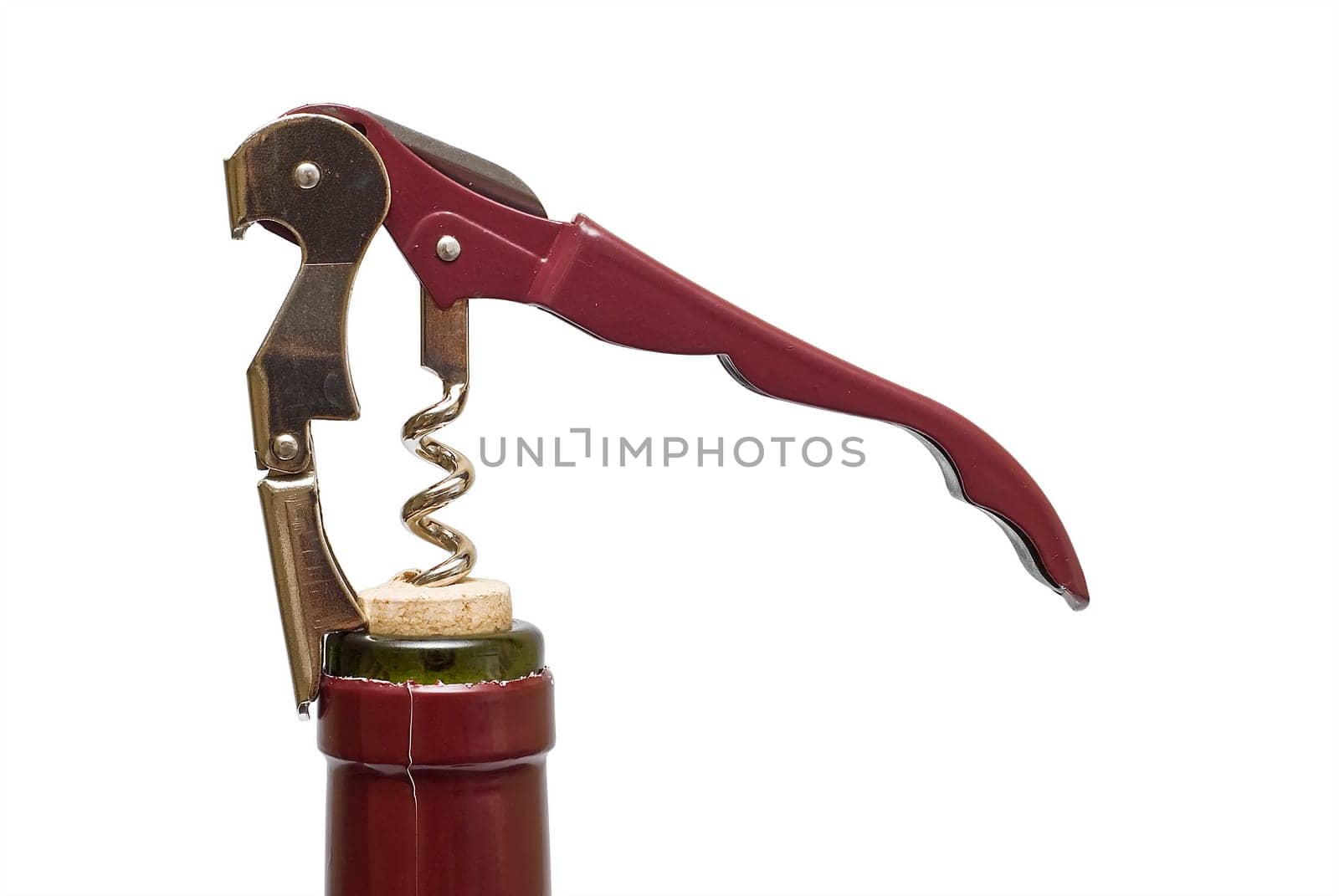 Corkscrew opening a red wine bollte over a white background.