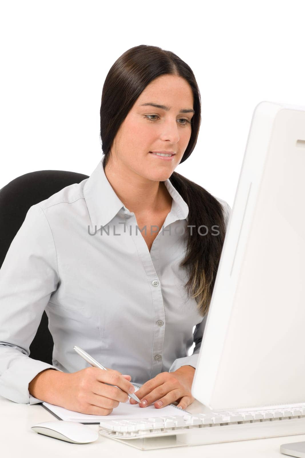 Successful business woman at office concentrating sitting table write notepad