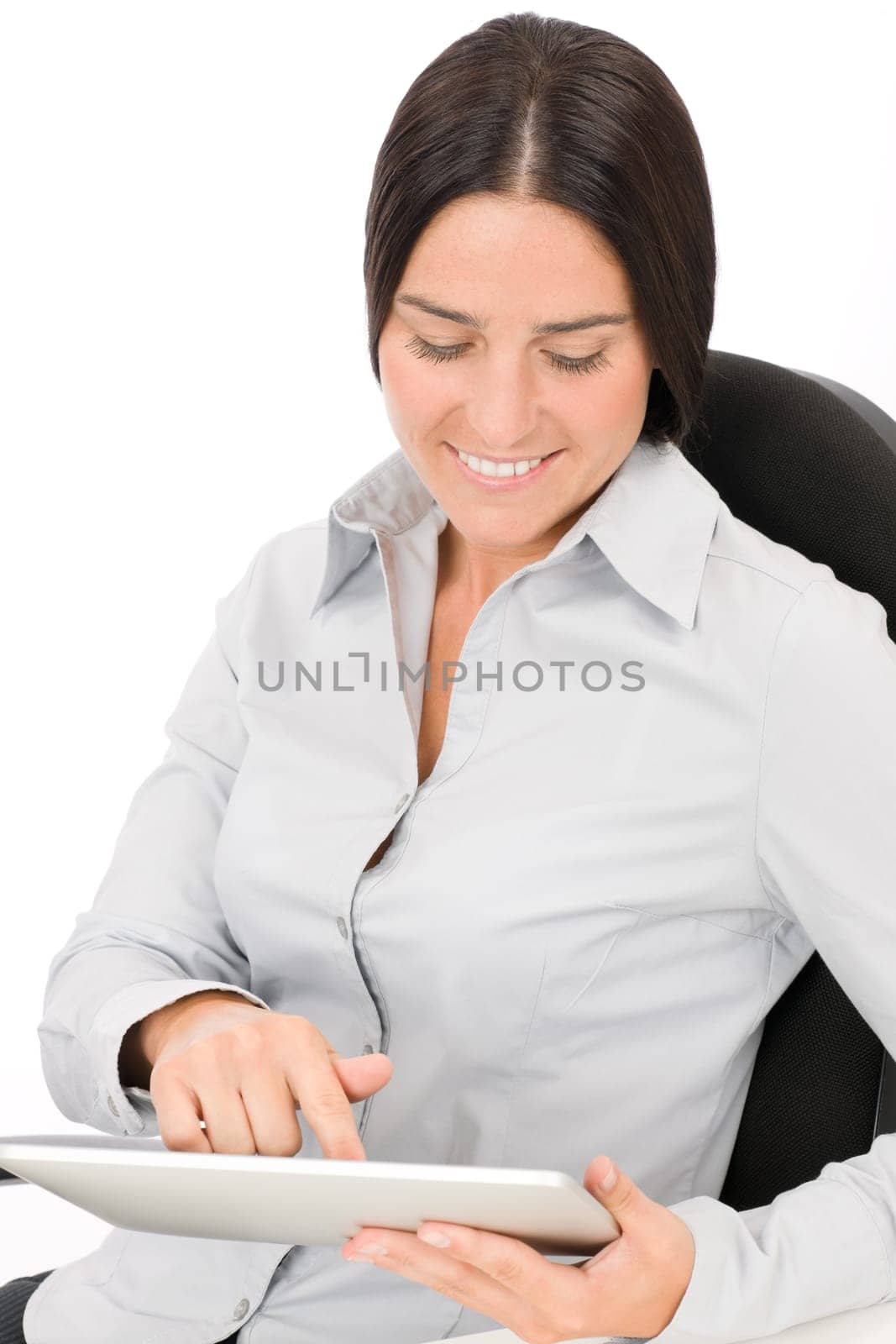 Attractive businesswoman holding touch tablet screen computer typing close-up portrait