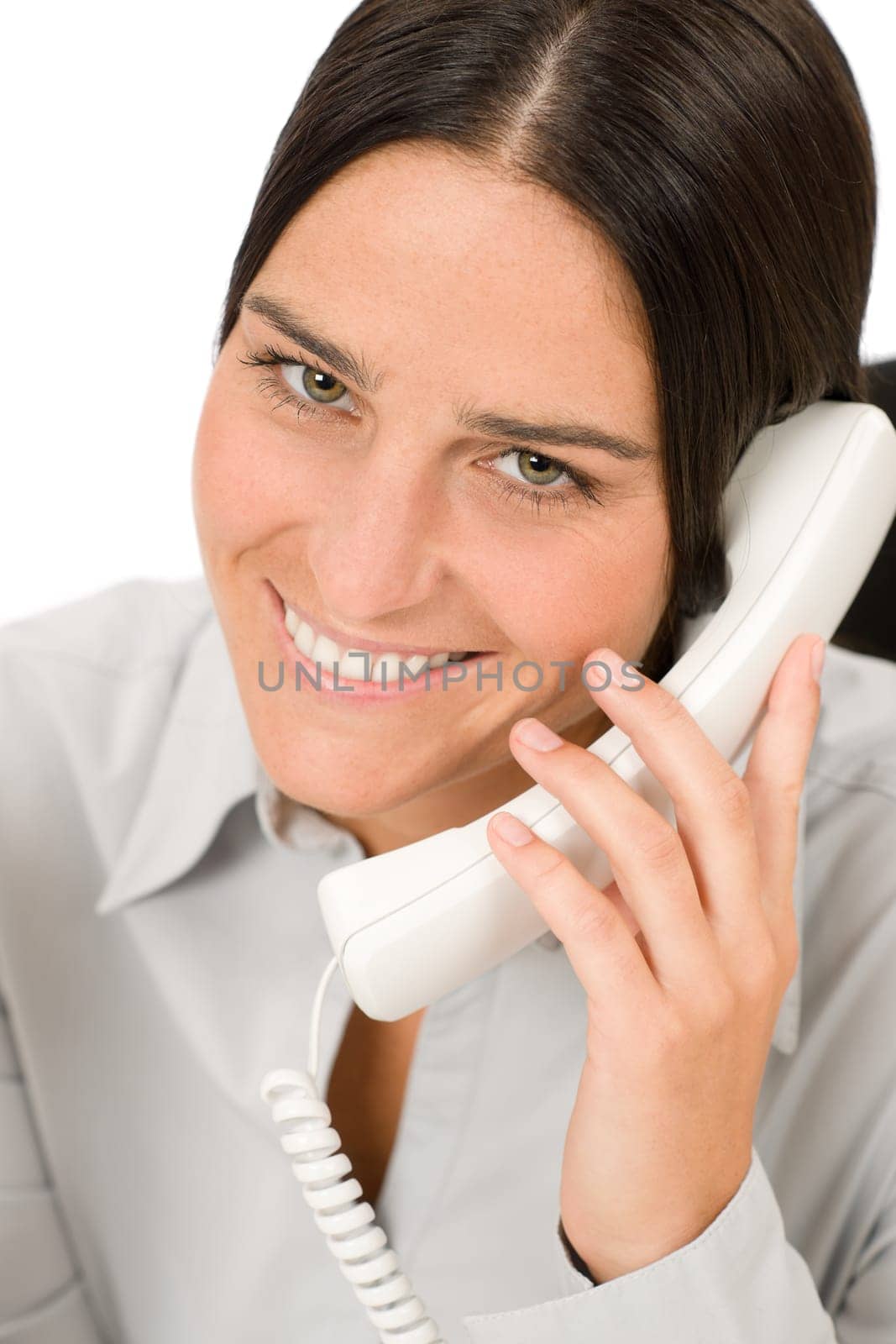 Smiling businesswoman attractive calling on phone close-up portrait