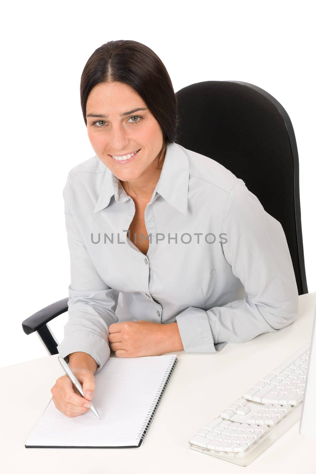 Successful business woman at office thinking sitting table write notepad