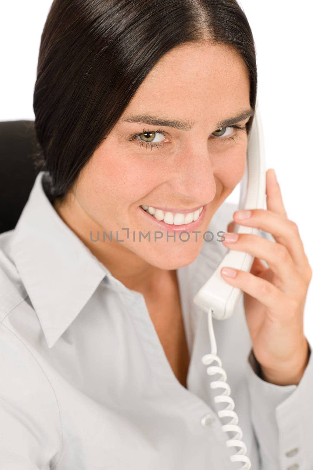 Smiling businesswoman attractive calling on phone close-up portrait