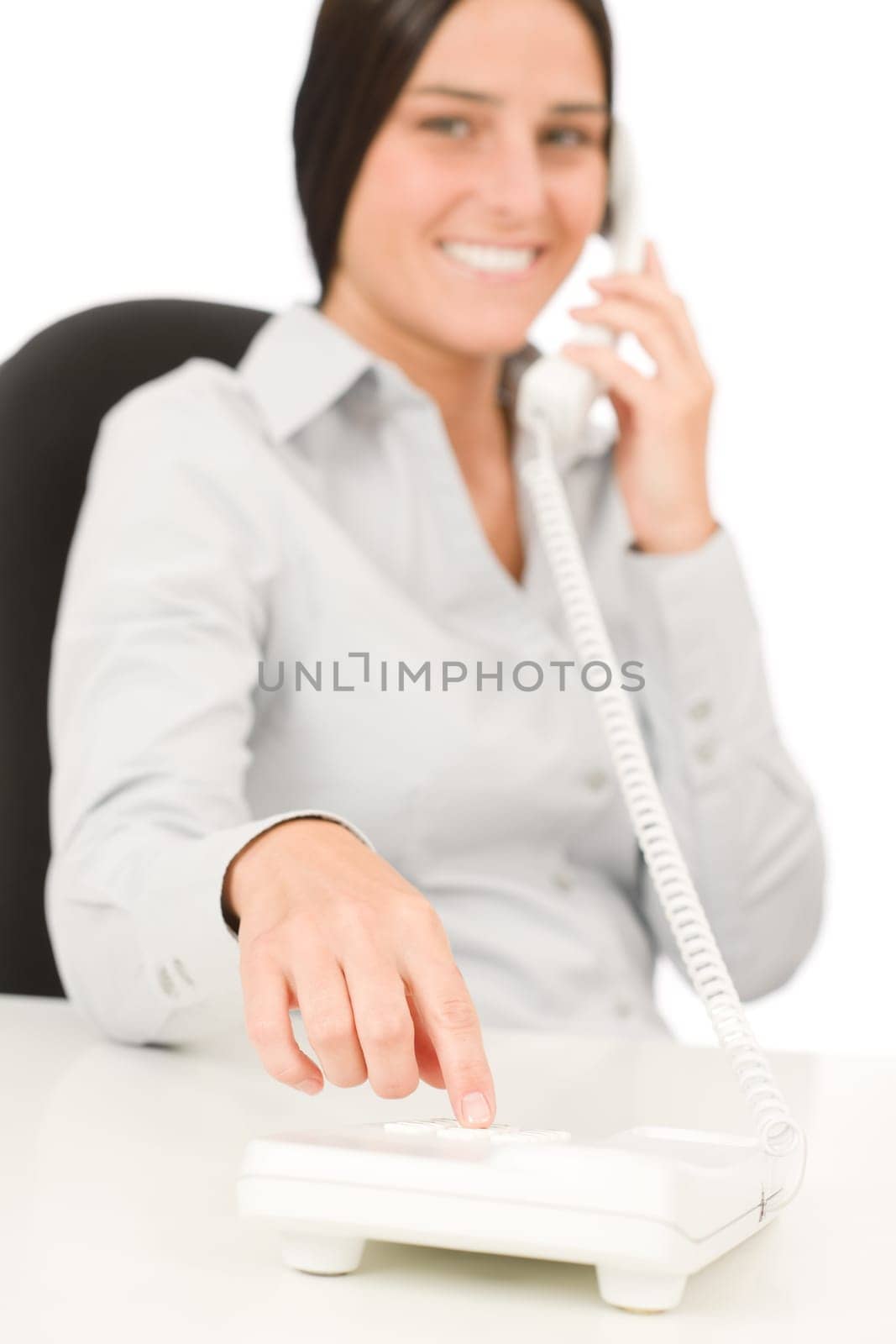Smiling businesswoman calling on phone attractive close-up portrait
