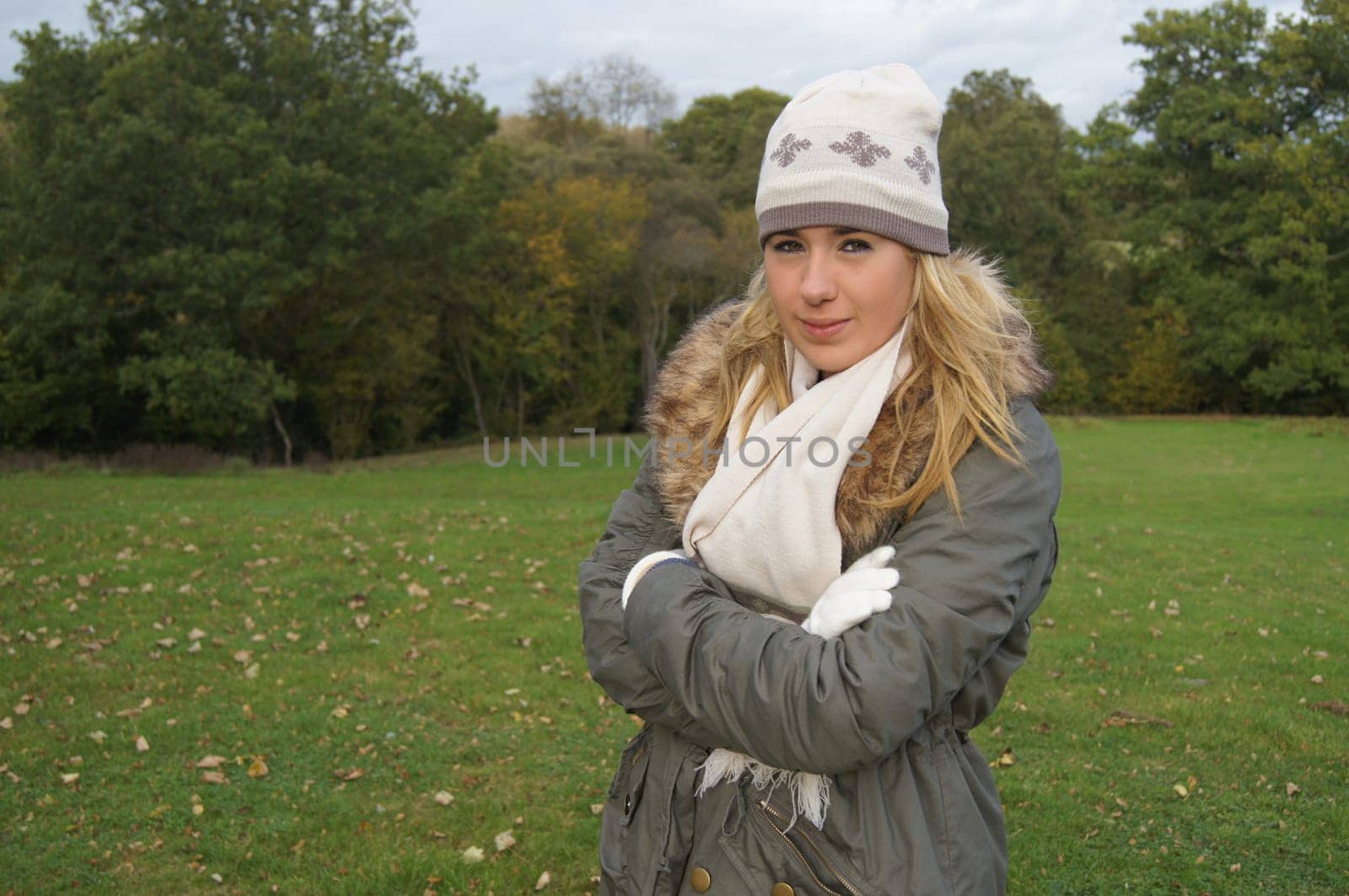 Pretty girl wearing warm clothes on a chilly day