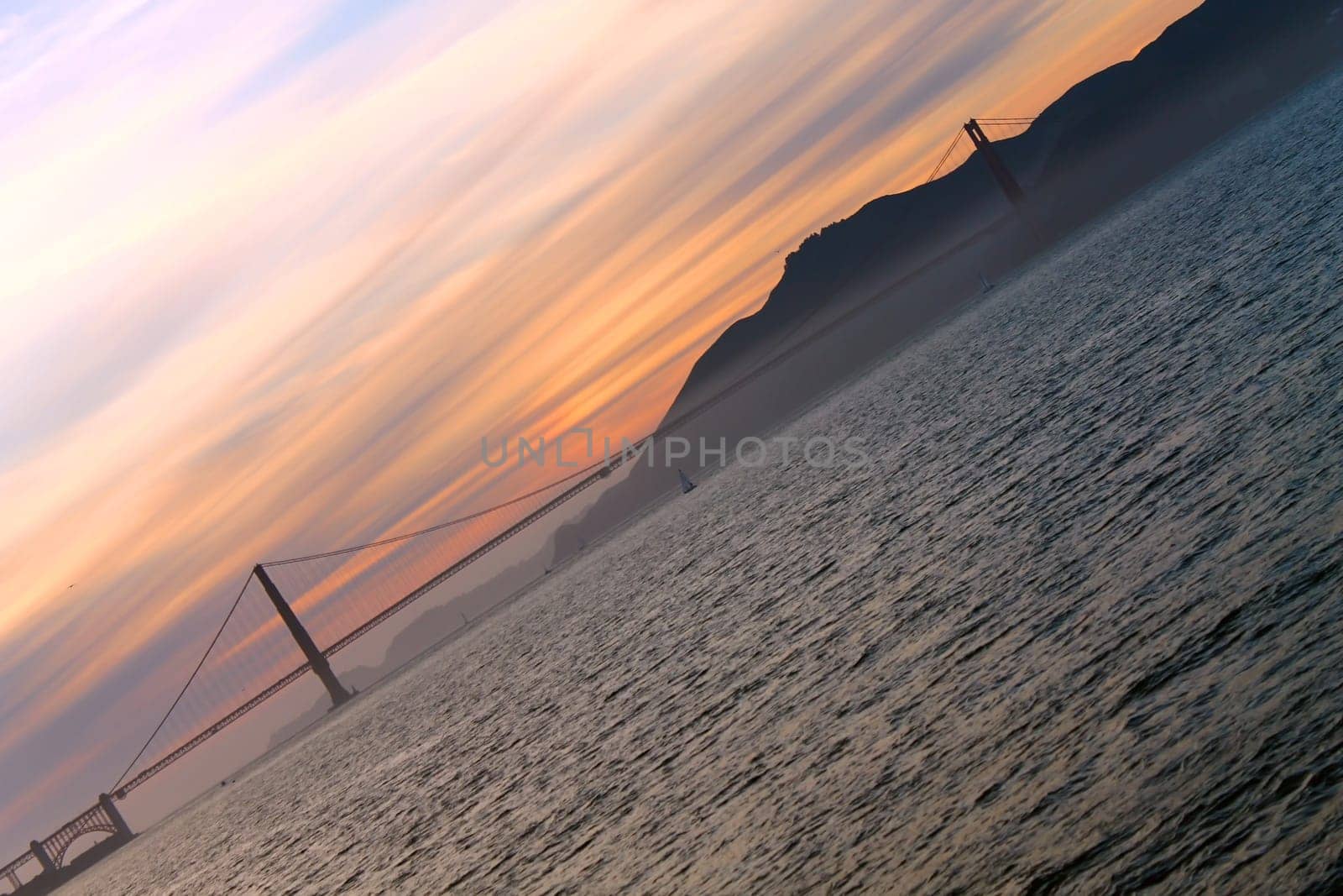 The colors of the sunset behind the Golden Gate briddge
