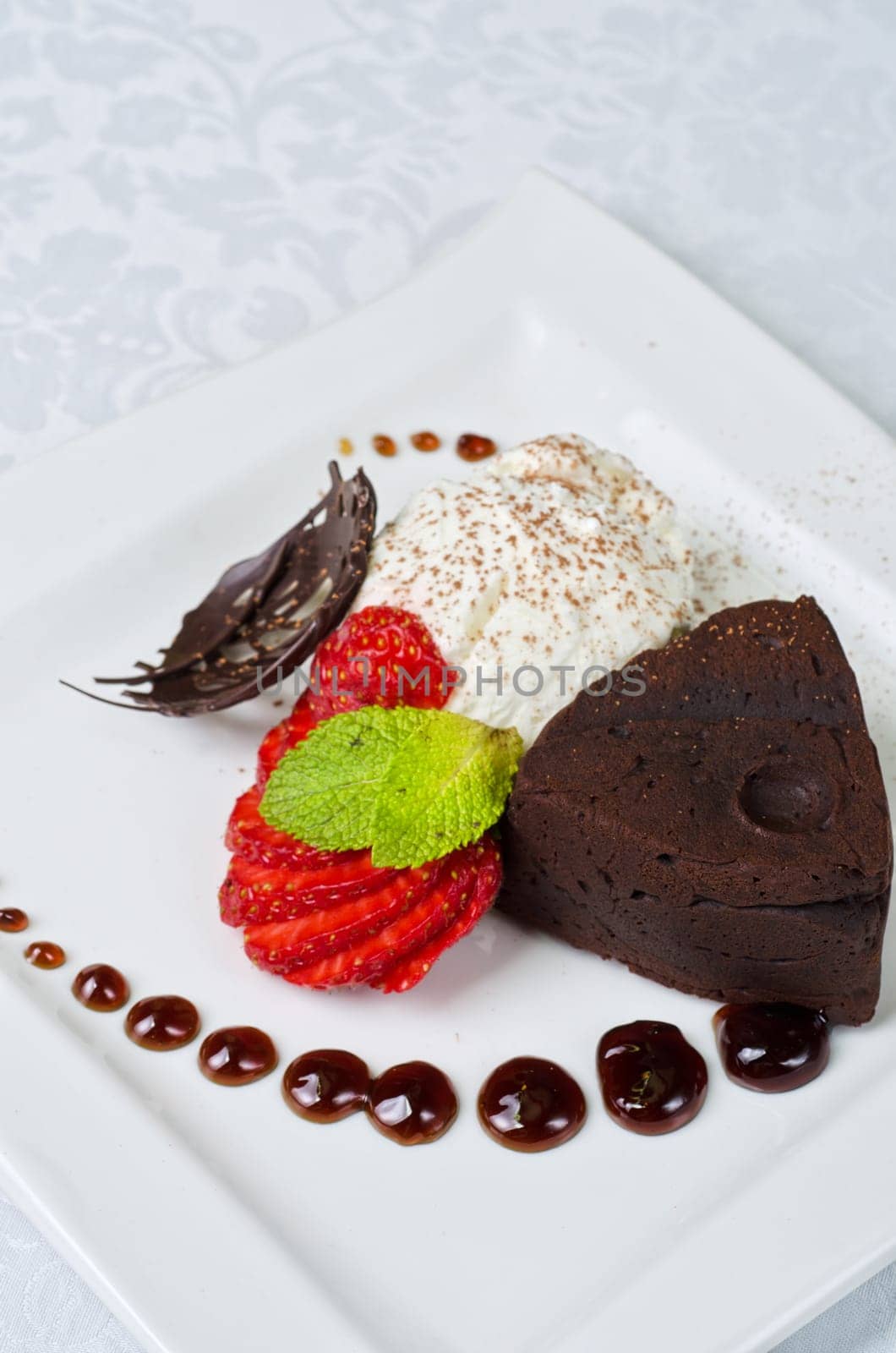 Chocolate flan with strawberries and chocolate, a wonderful dessert