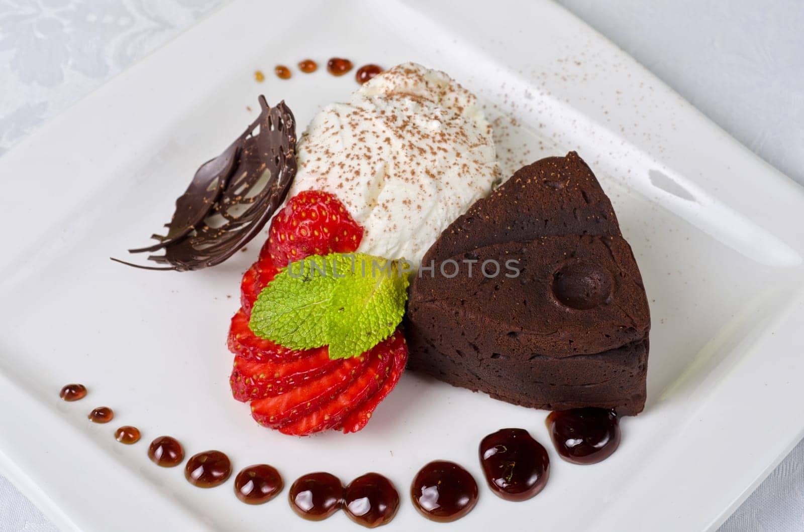 Chocolate flan with strawberries and chocolate, a wonderful dessert