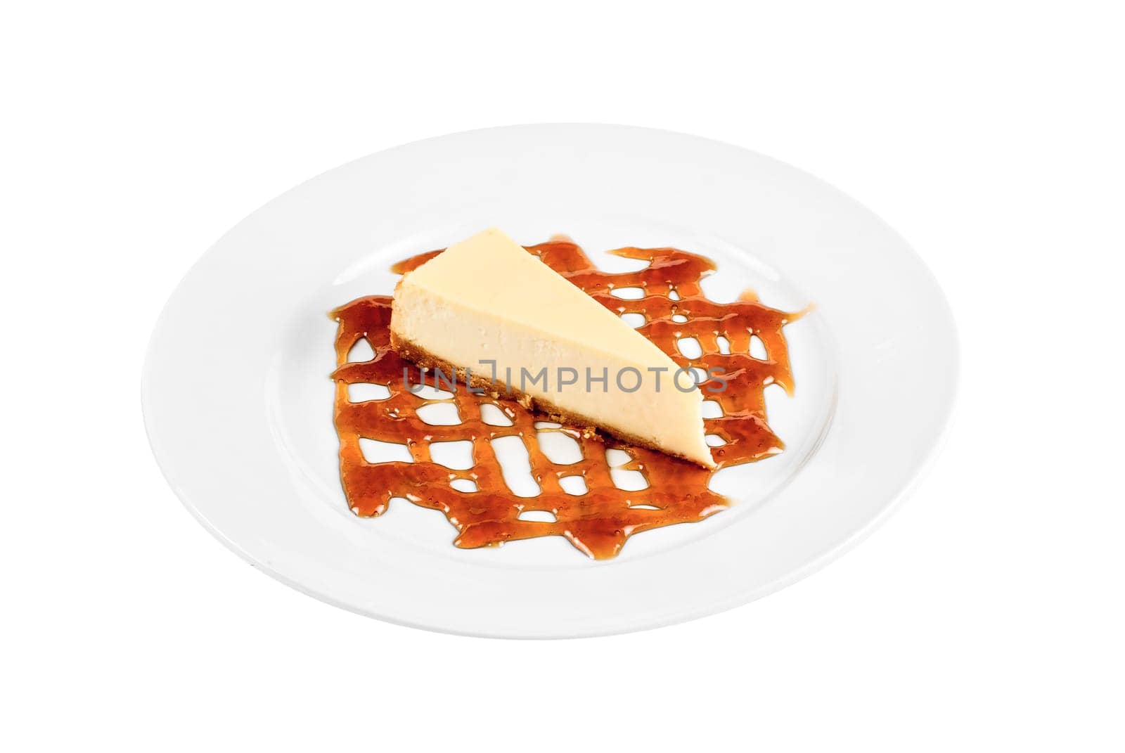 Cheese Cake with honey sauce closeup on white plate